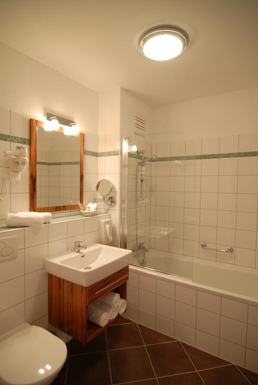Winzerhotel Gumpoldskirchen Pokoj fotografie